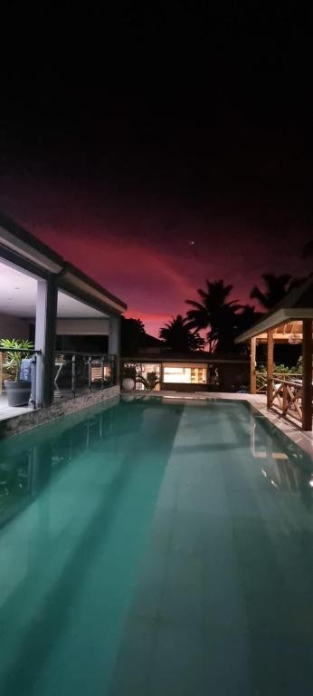 Villa Sunrise Moorea pool at dusk